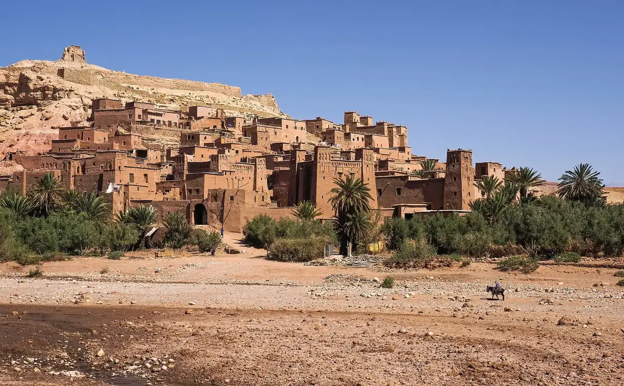 The earthen ksar of Ait Ben Haddou rising above the riverbed